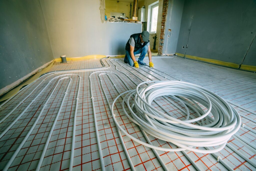 pipefitter installing system of heating royalty free image 1636641919 (1)